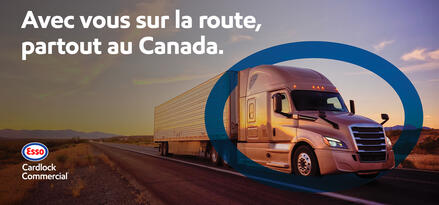 L'image montre un camion sur la route et le logo Esso